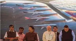  ?? BLOOMBERG PIC ?? India Prime Minister Narendra Modi (third from right) attending the launching of the Navi Mumbai Internatio­nal Airport project on Sunday.