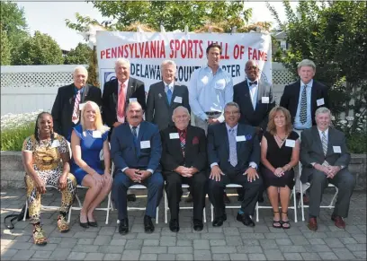  ?? SUBMITTED PHOTO — JOE TOWNSEND ?? Fredia Gibbs, far left, and Trish Juhline, second from left, anchor the front row in this class picture of the Pennsylvan­ia Sports Hall of Fame, Delaware County Chapter’s class of 2019.