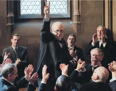  ??  ?? Gary Oldman as Winston Churchill flashes the V-for-victory gesture in a scene from Darkest Hour. JACK ENGLISH / FOCUS FEATURES VIA THE ASSOCIATED PRESS