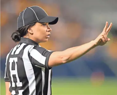  ?? CHARLES LECLAIRE/USA TODAY SPORTS ?? Maia Chaka is the first Black female official in NFL history.