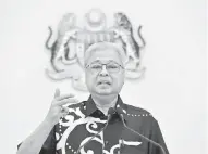 ?? — Gambar Bernama ?? SIDANG MEDIA: Ismail Sabri ketika sidang media harian Perintah Kawalan Pergerakan Bersyarat (PKPB) di Perdana Putra, Putrajaya semalam.