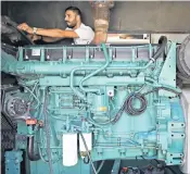  ?? ?? A man operates a generator in Beirut, as private generators provide vital backup to Lebanon’s brokendown power grid