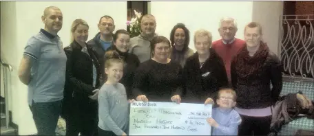  ??  ?? The Fox Family presenting a cheque for € 4400 to Cathryn O’Leary of North West Hospice proceeds of the New Years Eve Masquerade Ball in memory of Patrice.