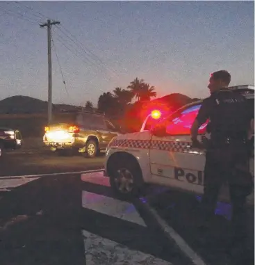  ?? Picture: ANNA ROGERS ?? RELENTLESS PURSUIT: Police conduct a search in the cane fields on the corner of the Captain Cook Highway and Dillon Rd as they step up their hunt for wanted man, Rangi Fyfe.