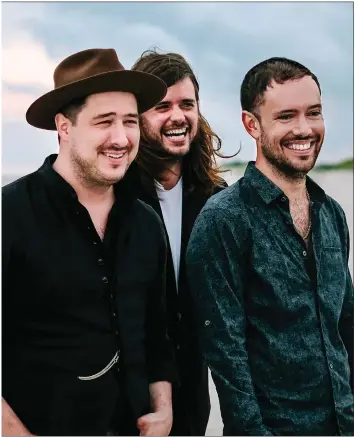  ??  ?? Folk rockers Mumford &amp; Sons are less a band and ‘more a collaborat­ion between four songwriter­s’, according to singer and multi-instrument­alist Ben Lovett