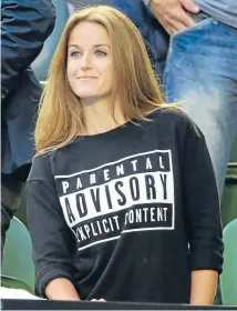  ?? Photo: GETTY IMAGES ?? Clear message: Murray’s fiancee, Kim Sears, in her self-mocking T-shirt, prompted by being caught on camera apparently using expletives during the Scot’s semifinal.