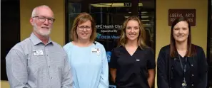  ?? The Sentinel-Record/Donald Cross ?? ■ From left, National Park College Dean of Students John Tucker, CHI St. Vincent Regional Director of Primary Care Operations Jennifer Thompson, CHI St. Vincent Nurse Practition­er Lacy Holley, and NPC Campus Nurse Miki Smith are shown outside the new campus health clinic on Wednesday.