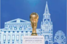  ?? — Reuters ?? The 2018 FIFA World Cup Winner’s Trophy is on display before the 68th FIFA Congress in Moscow.