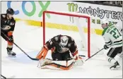  ?? ?? Ducks goaltender John Gibson makes a save on a shot by the Stars' Mason Marchment in the second period.