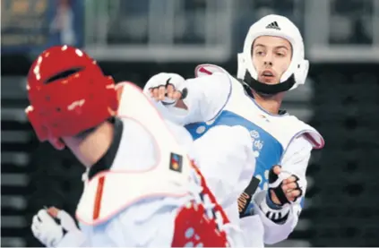  ??  ?? Lovro Brečić na prvenstvu Europe u Kazanju pobijedio je Turčina Redžbera i uzeo zlato