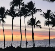  ??  ?? Sunset from the Humu Restaurant at the Grand Wailea.