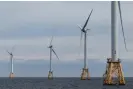  ?? Photograph: Julia Nikhinson/ AP ?? Turbines off the coast of Block Island, Rhode Island.