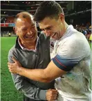  ??  ?? Happy days: Eddie Jones and Ben Youngs celebrate victory