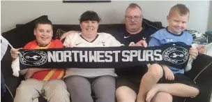  ??  ?? ●●Spurs fans Emma and Patrick Nottage with sons Kyle and Ollie
