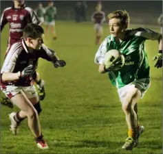  ??  ?? Cormac Doyle of Naomh Eanna takes on John Codd.