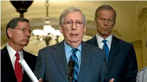  ??  ?? Senate Majority Leader Mitch McConnell, R-Ky., speaks with the media after the Senate Policy Luncheon in Capitol Hill in Washington.