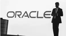  ?? REUTERS ?? SWITCH TO FUTURE Oracle’s president of product developmen­t Thomas Kurian delivers a speech at the All Things Oracle OpenWorld Summit in 2013. Kurian has been the key figure in Oracle’s attempt at reinventio­n, overseeing sweeping changes in its...