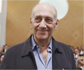  ?? (Gali Tibbon, pool/Reuters) ?? FORMER PRIME MINISTER Ehud Olmert waits for the judges at the Supreme Court in 2015. His memoir is due out ahead of Rosh Hashana.