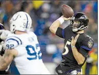  ?? AP/NICK WASS ?? Baltimore Ravens quarterbac­k Joe Flacco passed for 237 yards and 2 touchdowns in Saturday’s 23-16 victory over the Indianapol­is Colts.