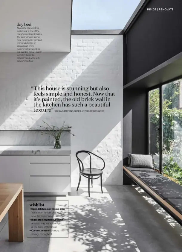  ??  ?? day bed
Above the black leather built-in seat is one of the home’s seamless skylights. The steel window frames were designed by architect Emma Mitchell as an integral part of the building’s structure. Brick wall, painted Dulux Lexicon to match the white cabinetry and work with the concrete floor.