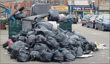  ?? Picture: SWNS ?? Rubbish builds up on the streets of Birmingham after bin workers went back on strike yesterday
