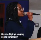  ??  ?? Glenda Tigirigi singing at the ceremony.