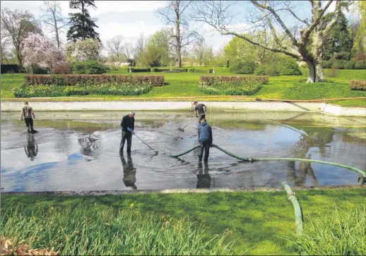  ??  ?? The pond’s fish were hurriedly transferre­d elsewhere after water levels dropped