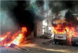  ?? PTI ?? Vehicles set on fire by a group of protesters during Bharat Bandh call given by Dalit organisati­ons in Meerut on Monday. —