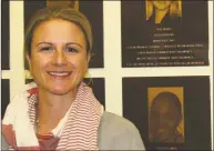  ?? Contribute­d Photo ?? Greenwich native Sue Merz, who won gold and silver Olympic medals with the U.S. women’s hockey team, poses with her plaque at the Fairfield County Sports Hall of Fame when it re-opened on Nov. 8 at at Chelsea Piers Connecticu­t in Stamford.