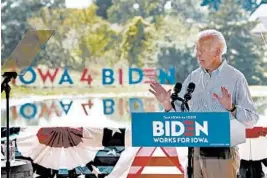  ?? CHARLIE NEIBERGALL/AP ?? During a campaign swing through Iowa, presidenti­al candidate Joe Biden reminded voters that the Obama administra­tion handed President Donald Trump a strong economy.