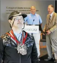  ?? SUBMITTED PHOTO ?? Bruce Gillespie poses proudly with his medals as Sam Goldenberg and Peter Sonski look on with joy.