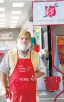  ?? ?? Mangual started ringing the Salvation Army bell about 20 years ago.“It helps the needy,” he said of the of the money donated and the mission of the Salvation Army.