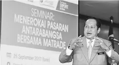  ??  ?? Maslan gestures as he offiates a seminar jointly organised by Malaysia External Trade Developmen­t Corp (Matrade) and Yayasan Amal Maaruf Malaysia yesterday. — Bernama photo