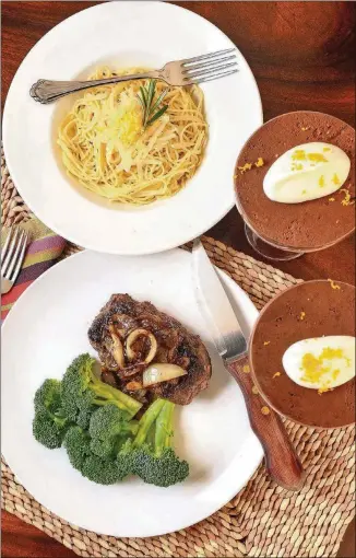  ?? FOOD STYLING BY MERIDITH FORD. CONTRIBUTE­D BY CHRIS HUNT ?? Salisbury Steaks with Caramelize­d Onions saves time and is an economical way to dress up ground sirloin (bottom). Mock Chocolate Mousse takes the guess work out of this classic dessert (at right). Lemon and Garlic Spaghetti is an easy weeknight meal, made with items that are probably already in your pantry (top).