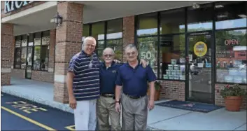  ?? GREGG SLABODA - TRENTONIAN PHOTO ?? Rob Hafitz, (left) Rich Linnell and Ray Davidson from Rich’s Carpet One Floor & Home in Hamilton.