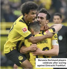  ?? ?? Borussia Dortmund players celebrate after scoring against Eintracht Frankfurt.