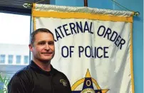  ?? CORNELIUS FROLIK / STAFF ?? Police officers are overworked, underpaid and do not feel supported by elected and appointed leaders, said Kyle Thomas, president of the Dayton Fraternal Order of Police Lodge No. 44.