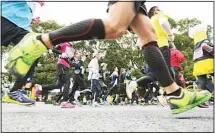  ??  ?? In this Feb 23, 2014, file photo, runners compete during the Tokyo
Marathon in Tokyo. (AP)