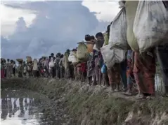  ?? (Getty) ?? At least half a million Rohingya Muslims have fled Rakhine state amid a crackdown by the military