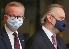  ??  ?? Upbeat: Michael Gove and Sir Tim Barrow yesterday