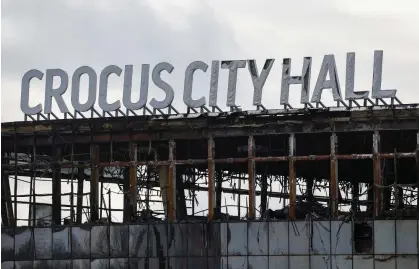  ?? ?? The burnt-out Crocus City Hall near Moscow on Tuesday. Photograph: Evgenia Novozhenin­a/Reuters