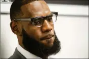  ?? ASSOCIATED PRESS ?? IN THIS JULY 30 FILE PHOTO, LeBron James listens to a question at a news conference after the opening ceremony for the I Promise School in Akron, Ohio.