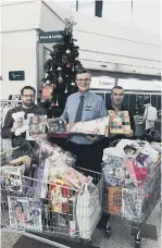  ??  ?? Jeff Williams, Neil Thornton and Cliff Rudling, from Morrisons Doxford Park, with toys for the Sunderland Echo Toy Appeal 2018.