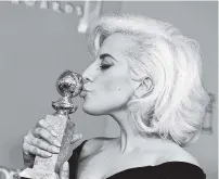  ?? ASSOCIATED PRESS FILE PHOTO ?? Lady Gaga poses in the press room with the award for best performanc­e by an actress in a limited series or a motion picture made for TV for “American Horror Story: Hotel” at the 73rd annual Golden Globe Awards in Beverly Hills, Calif., earlier this year.