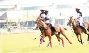  ?? ?? Players chasing after the ball in one of the final matches of the 2022 Carnival Polo Tournament.