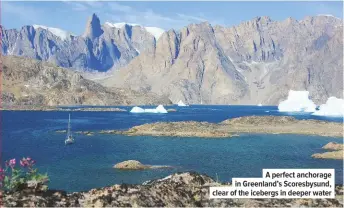  ??  ?? A perfect anchorage in Greenland’s Scoresbysu­nd, clear of the icebergs in deeper water