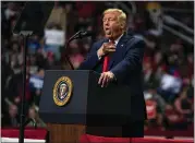  ?? EVAN VUCCI — THE ASSOCIATED PRESS ?? President Donald Trump makes a joke as he speaks during a campaign rally at Bojangles Coliseum in North Carolina.