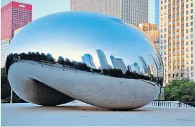  ??  ?? Anish Kapoor in front of a mirror work; below, Chicago’s Cloud Gate, 2006; right, Descent into Limbo, 1992