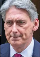  ??  ?? Bland: Mr Hammond yesterday
