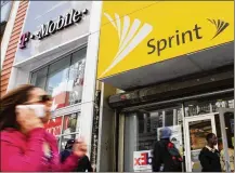  ?? MARK LENNIHAN / AP 2010 ?? A group of state attorneys general are planning a lawsuit to block a $26.5 billion merger of wireless carriers T-Mobile and Sprint ahead of a decision by federal antitrust authoritie­s.